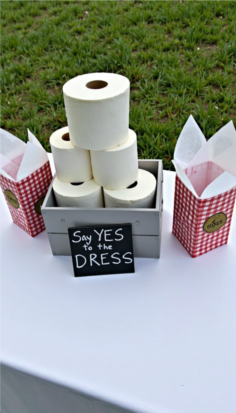 Fun bridal shower game where boys and girls compete to make wedding dresses out of toilet paper.
