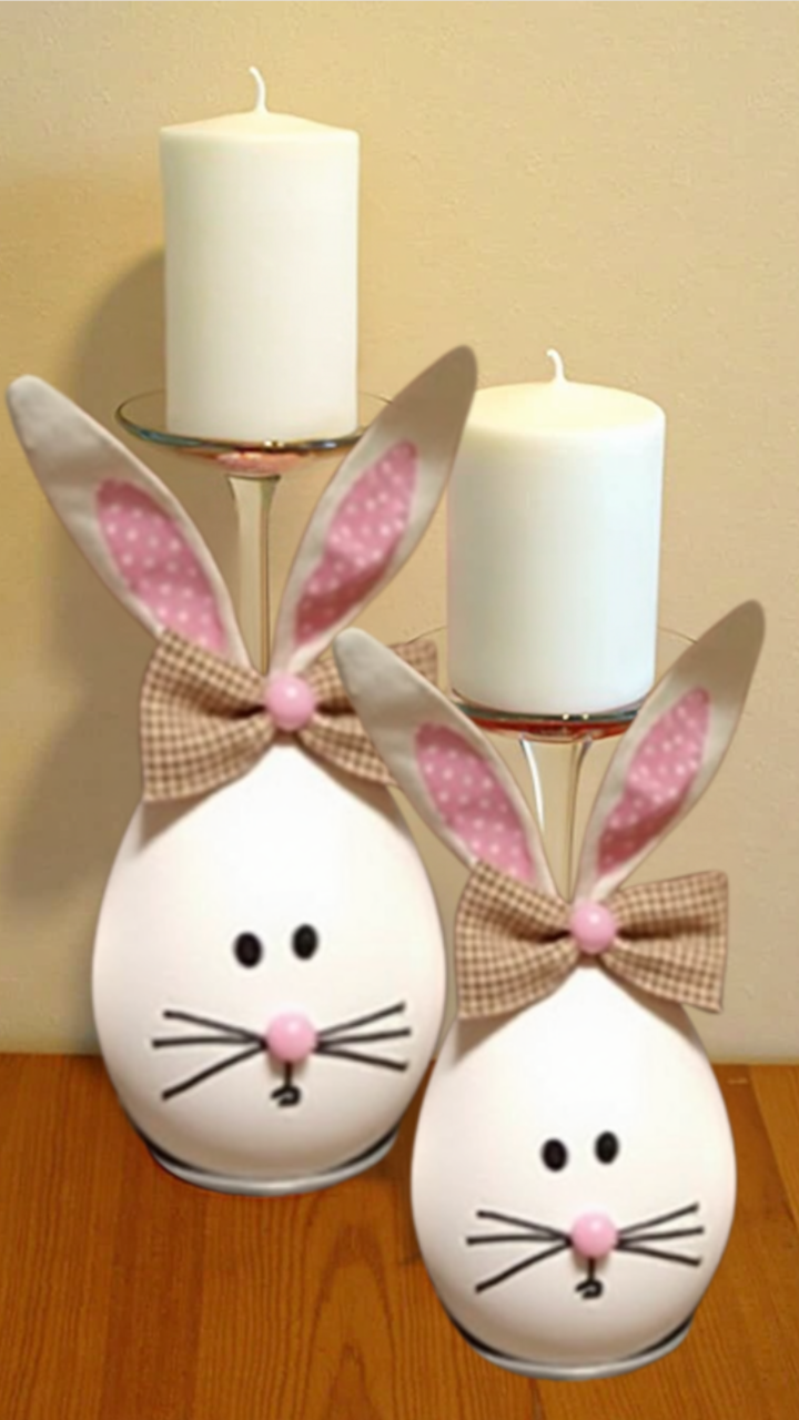 Upside-down wine glasses turned into Easter bunny candle holders with pink noses, felt ears, and bow ties
