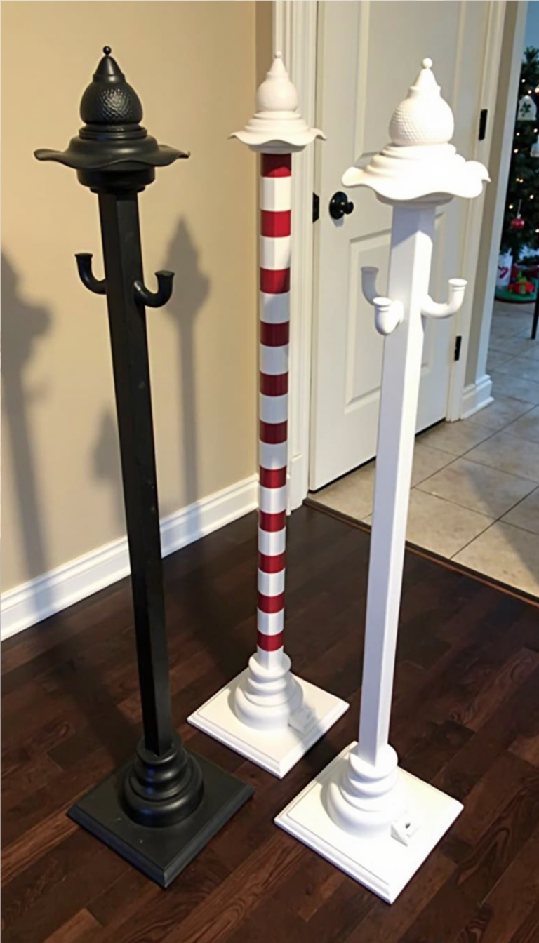 DIY free-standing Christmas stocking holders made from repurposed posts, painted black, white, and candy cane red and white stripes.