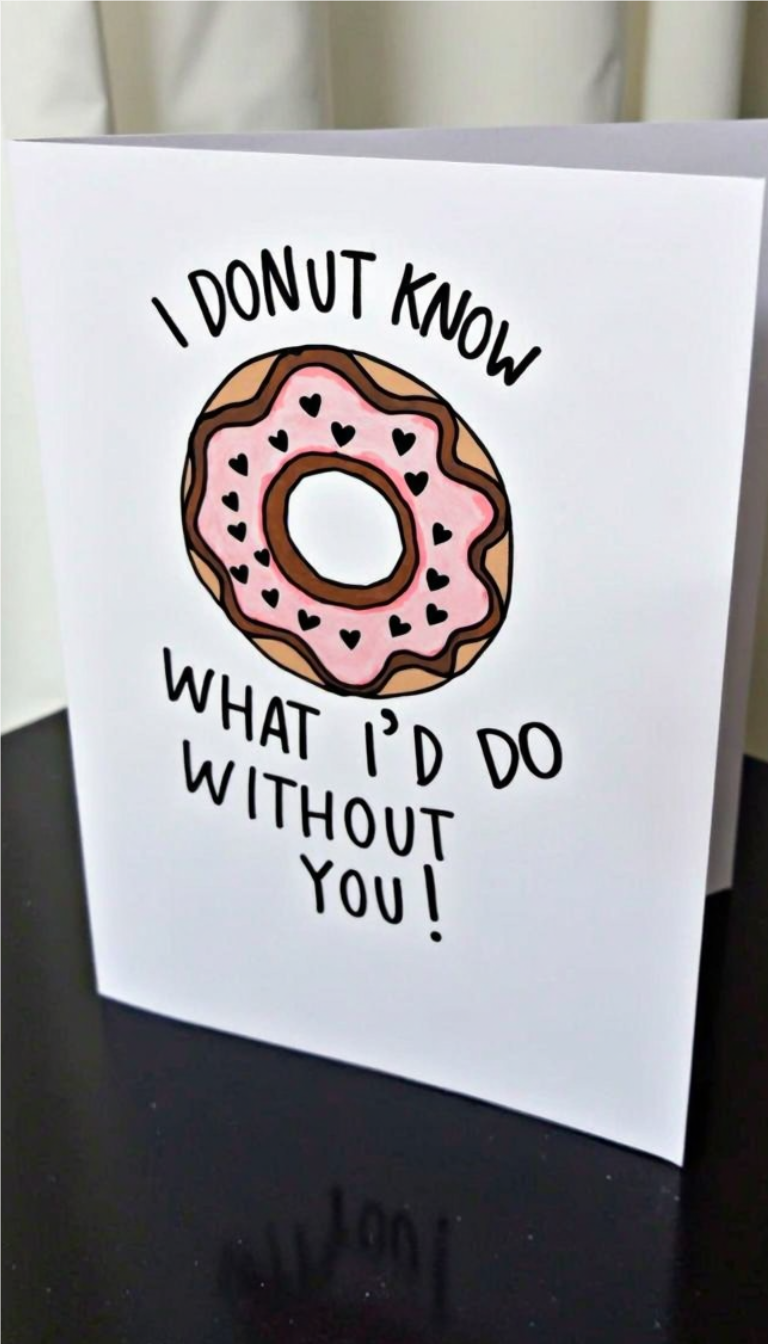 DIY Valentine’s Day card with pink frosted donut illustration and the pun 'I donut know what I’d do without you'